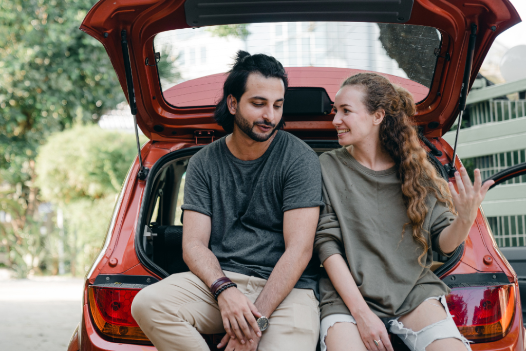 Photo by Ketut Subiyanto: https://www.pexels.com/photo/young-diverse-couple-relaxing-after-unpacking-car-while-moving-home-4246265/